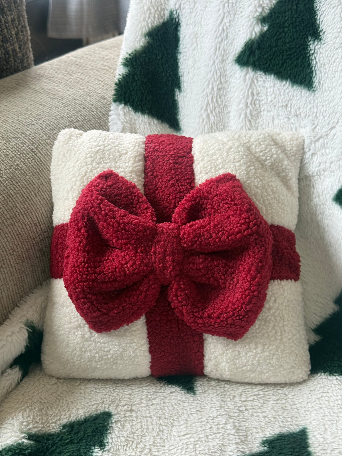 Pillow with Red Bow Accent