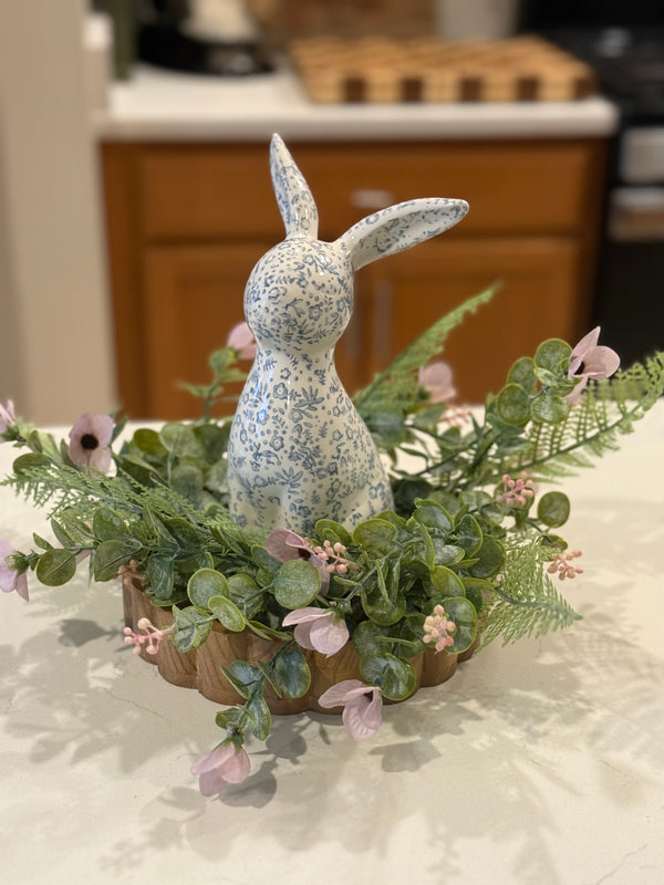 Simple, sweet, and full of spring charm. 🌿🐰A soft little moment for your home. The large scallop wood tray creates the perfect base, layered with our castaway candle ring for a touch of fresh greenery and delicate blooms. At the center sits the floral bunny, adding just the right hint of seasonal charm.This easy styling moment is proof that sometimes the simplest pieces make the most beautiful statement.Fresh, light, and ready to brighten any table, island, or countertop. 🌸