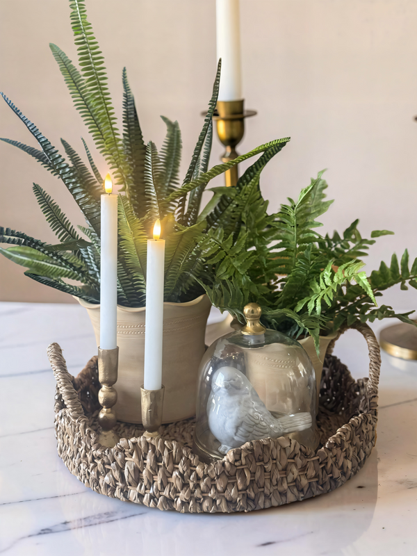 Soft textures. Warm glow.Effortless styling.A simple tray, a touch of greenery, and candlelight-because the little details make a home feel beautiful.Save this for your next centerpiece idea