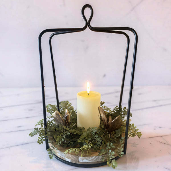 A soft glow, a touch of greenery, and just the right it of gold tOur Golden Garden Glow bundle brings together a timeless lantern, a lush real touch fern candle ring, a warm flameless candle, and delicate gold butterflies for that elevated, effortless finish.It's the kind of piece that quietly transforms a space-layered, inviting, and beautifully styled without the fuss.