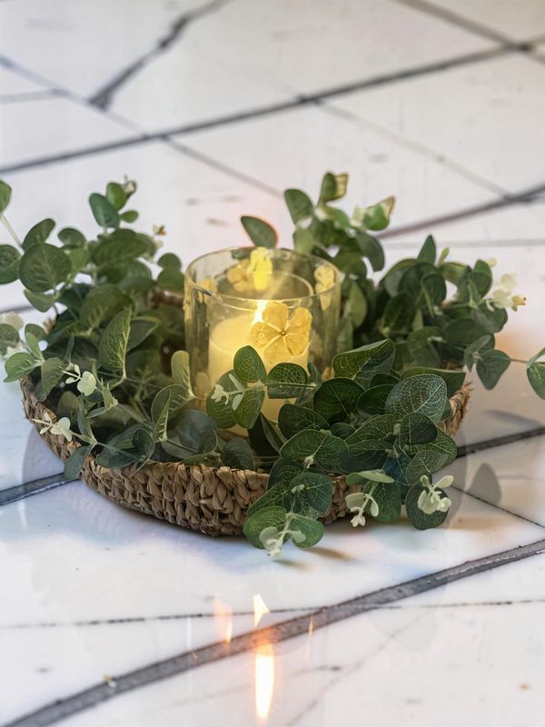 A soft glow, a touch of greenery, and a moment that feels instantly calm.This simple centerpiece brings warmth and texture together so effortlessly-woven layers, fresh greens, and a flicker of light that makes your space feel lived in and loved.Sometimes, it's the quiet details that make a home feel its most beautiful#CozyHome #SimpleStyling #NeutralDecor #HomeDetails #EverydayBeauty